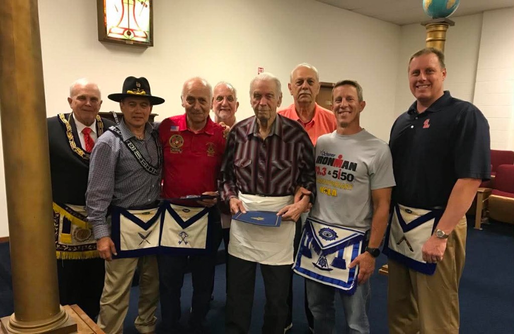 Dante Lodge brethren gathered in the lodge room — brothers in Masonic regalia